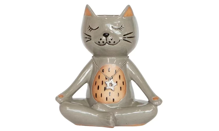 The quirky kitty cat vase adds whimsy to any space with its playful design, perfect for cat lovers and eclectic decor